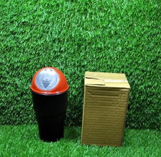 Compact car dustbin for efficient trash storage.