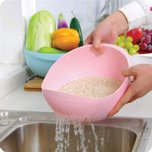 Large plastic strainer bowl for rinsing and storing rice and other grains.