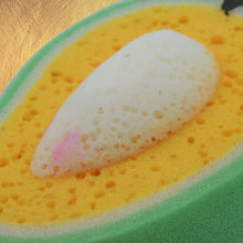 Close-up of mango dish sponge with soft texture